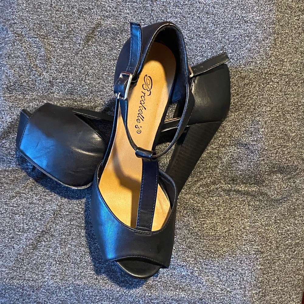 Breckelle’s black t-strap peep toe heels